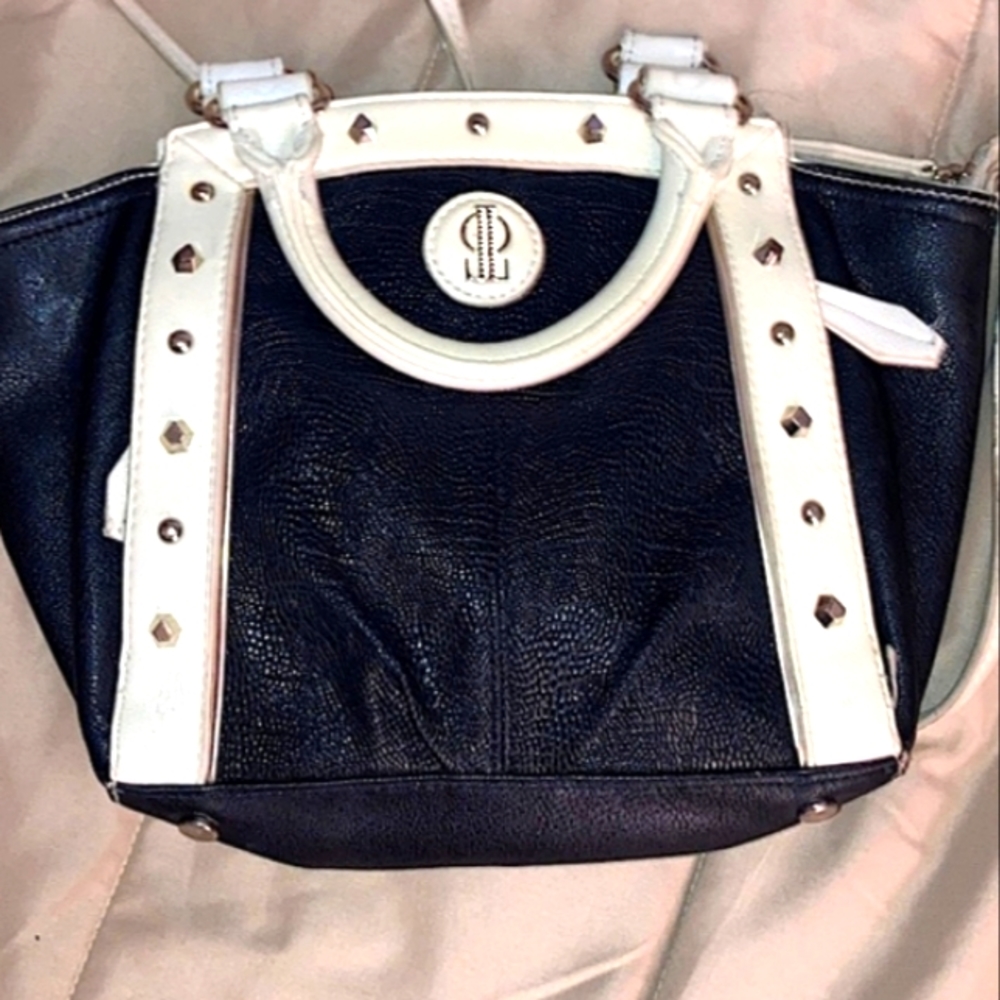 J Lo Black and antique white purse